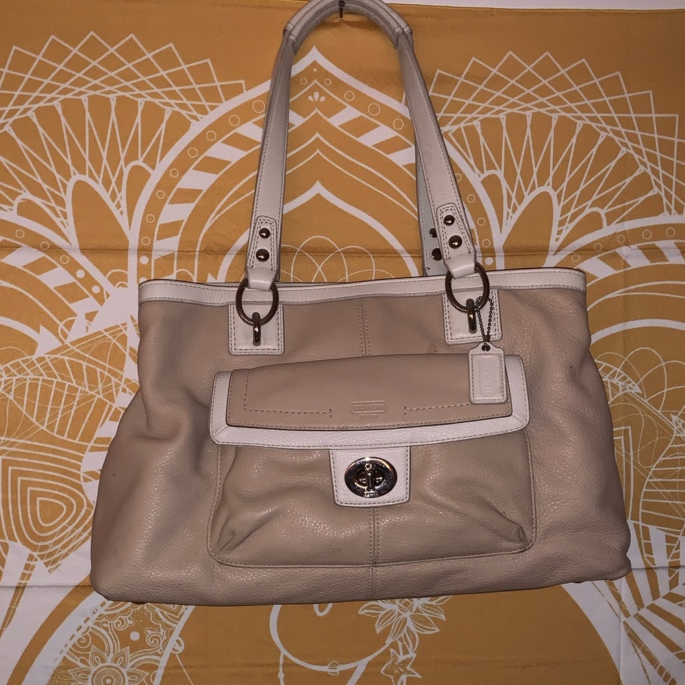 cream coach purse